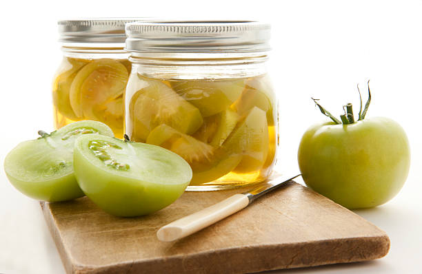 decorative canning homemade green tomatoes - pickled green tomatoes stock pictures, royalty-free photos & images